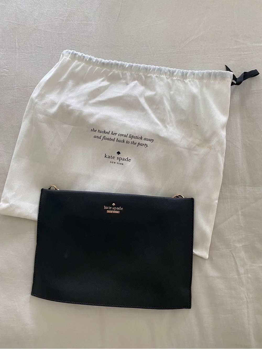 kate spade black leather wristlet clutch with gold logo
